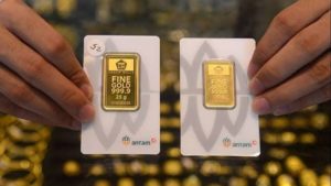 Harga Emas Antam Turun Tajam, Apa Penyebabnya?